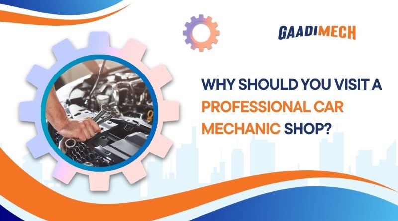 Professional car mechanic inspecting engine at a car mechanic shop in Jaipur for maintenance and repair services.